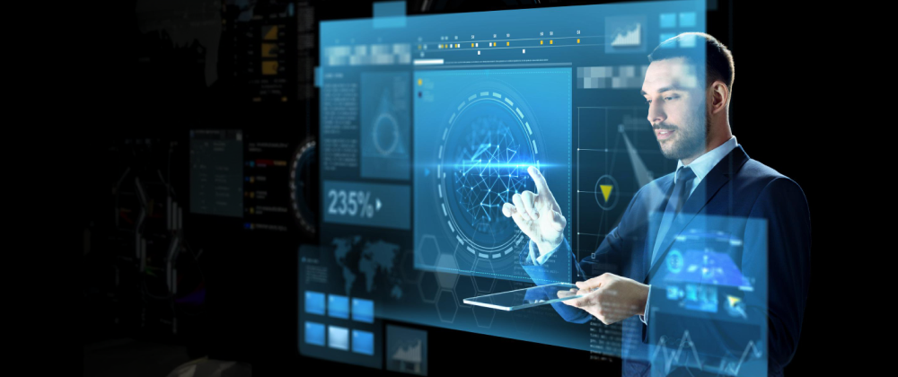 Business professional in a modern Amsterdam office using an AI agent platform on dual monitors